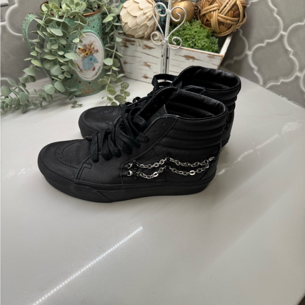 Black leather Vans